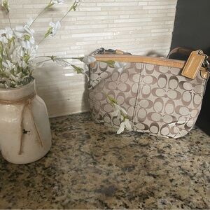 Coach Beige and Brown Signature Shoulder Bag, it has a stain on the strap.